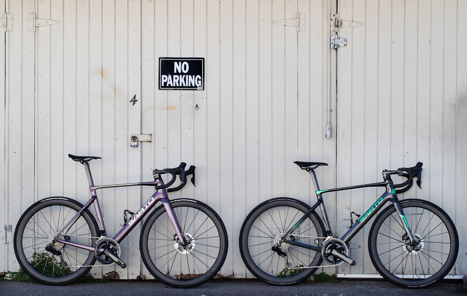 Two complete Sarto road bikes fitted with Partington R-Series carbon wheels for installed decal context