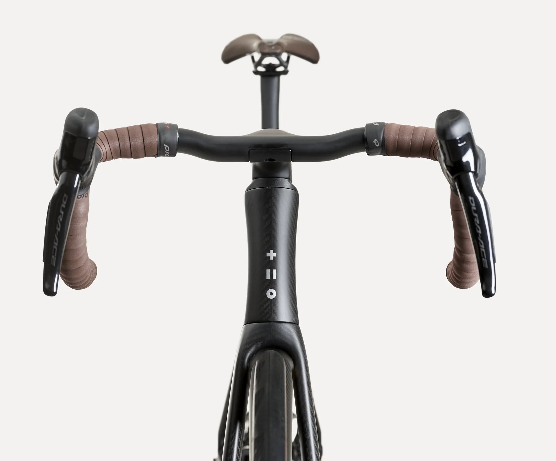 SWI one-piece carbon handlebar and stem fitted to Aequus in Raw Matte